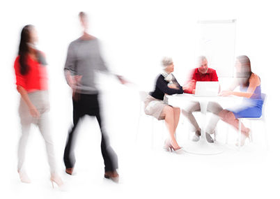 Learning and development professionals sitting at a table working together